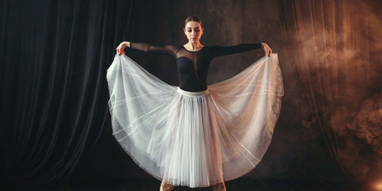 classical-ballet-dancer-in-motion-on-the-stage-1